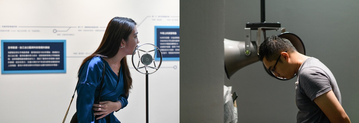 A photo showing a male and a female yelling in microphones