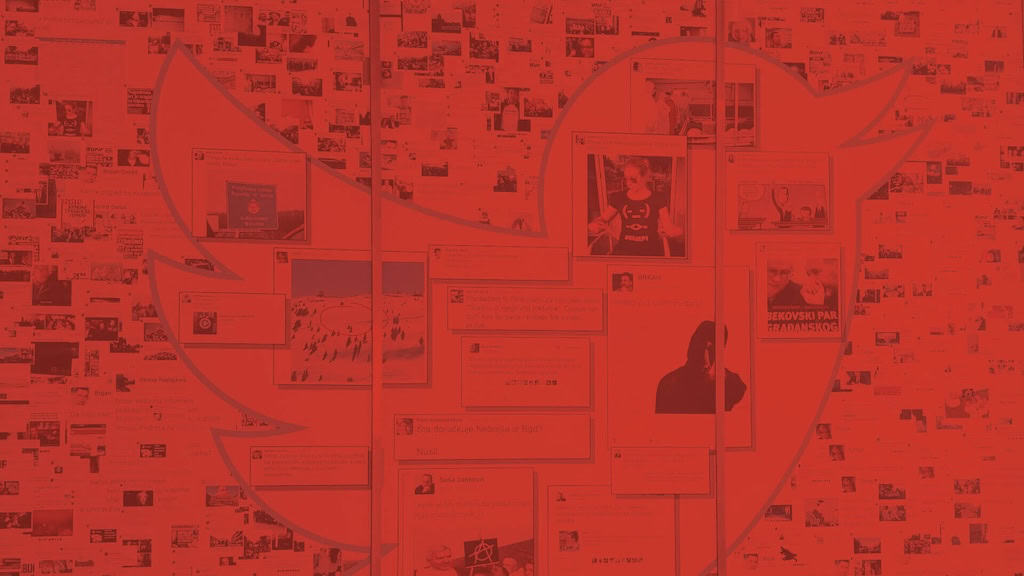 A photo showing a wall of printed-out Tweets